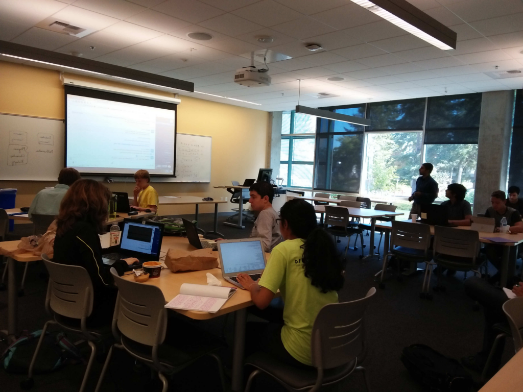 students on computers in a classroom